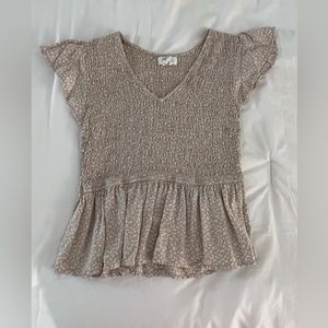 Beige peplum cheetah top